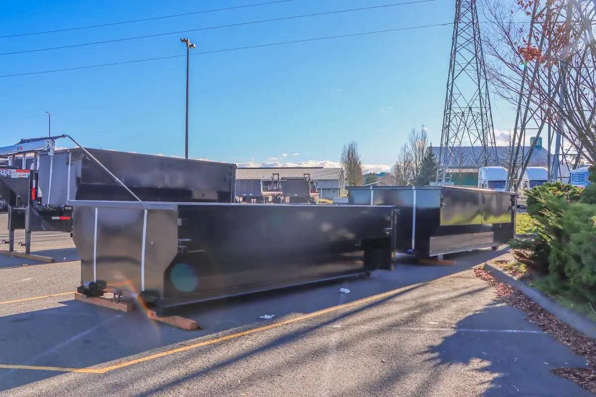 Roll-off dumpster ready for waste disposal at job site for 15 Yard Dumpster Rental in Crestview